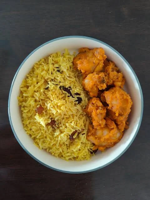 basanti palau with aloo dum