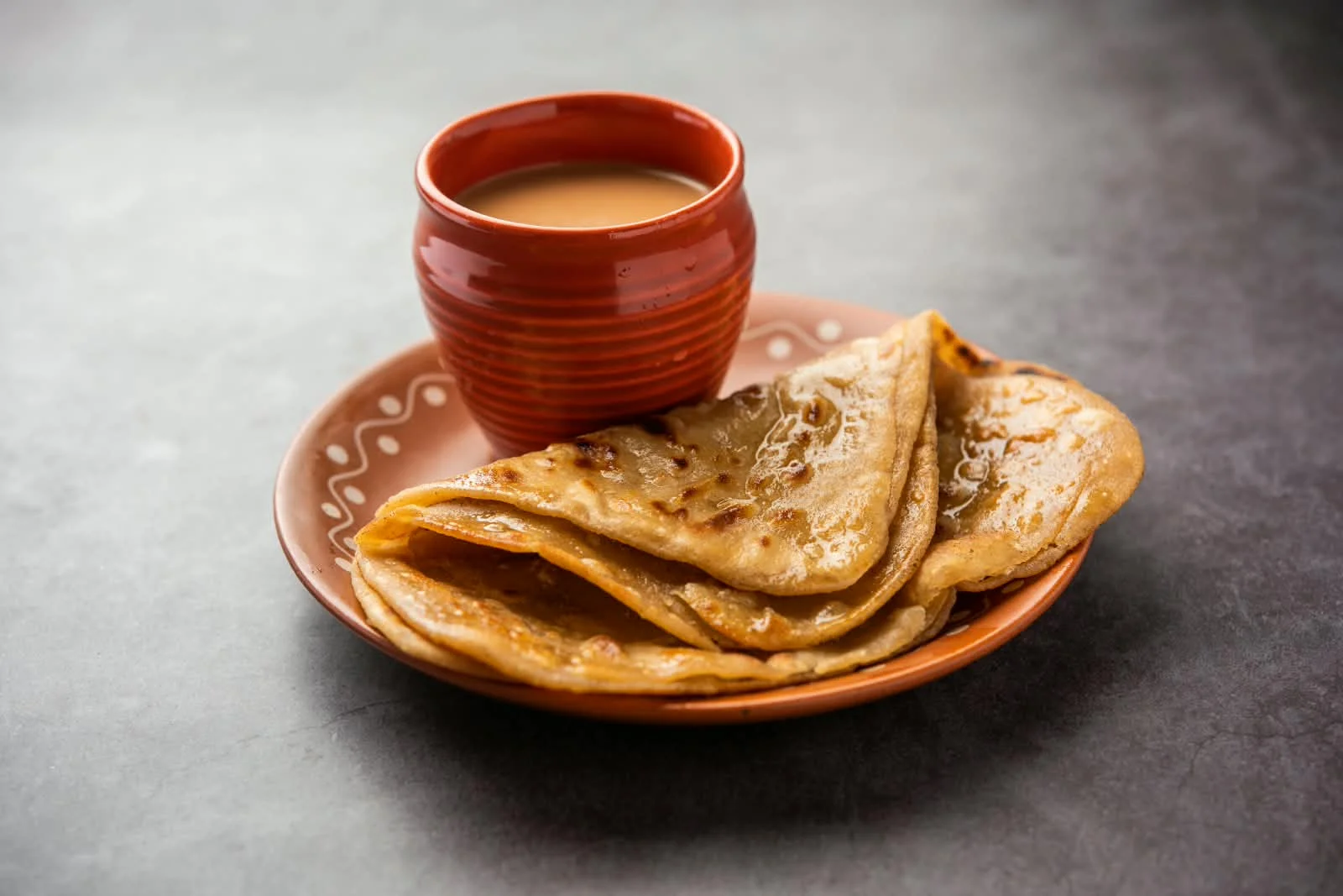 Masala Tea with Traingle Paratha
